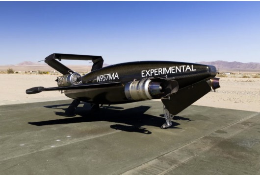 P100 experimental jet-powered VTOL aircraft on a desert flight pad